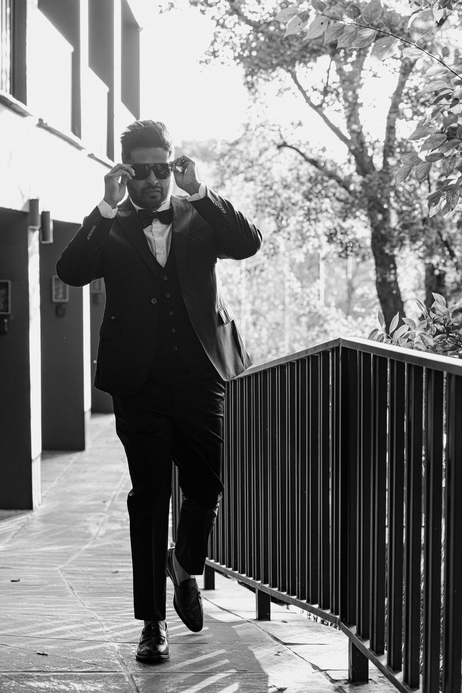 Groom getting ready portrait, wedding morning preparation