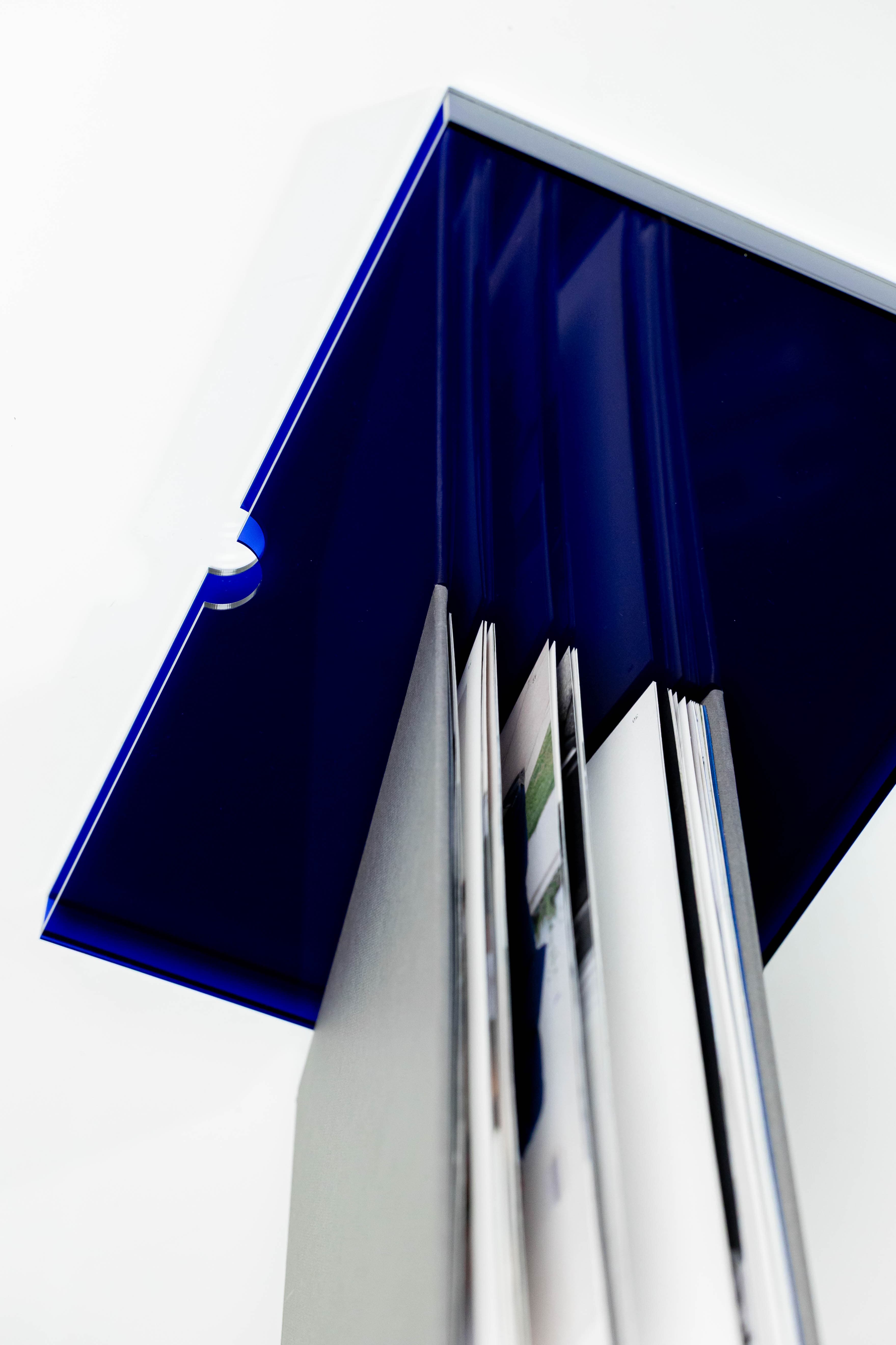 Architectural view of album pages fanning open