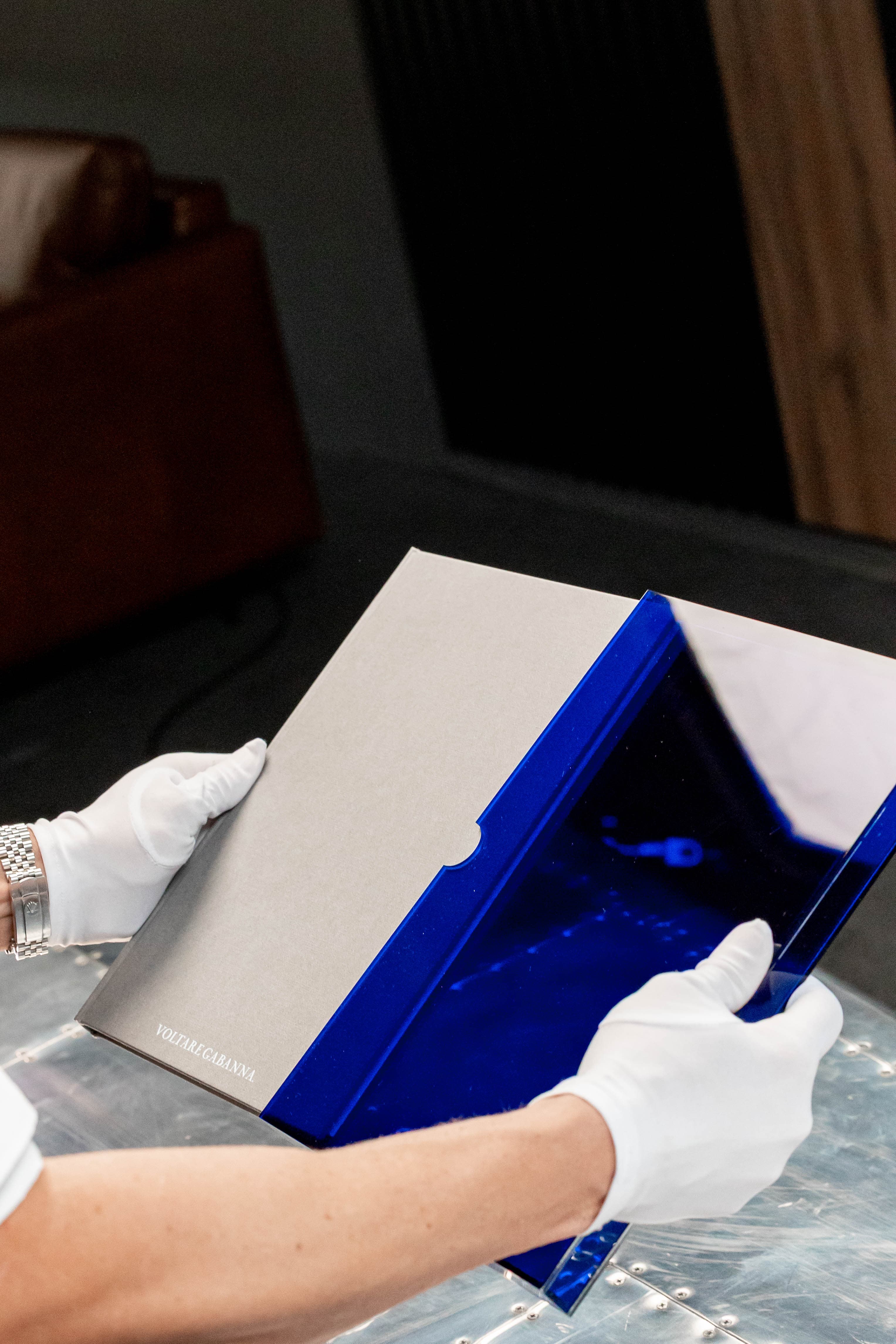 Album placed into royal blue perspex presentation box