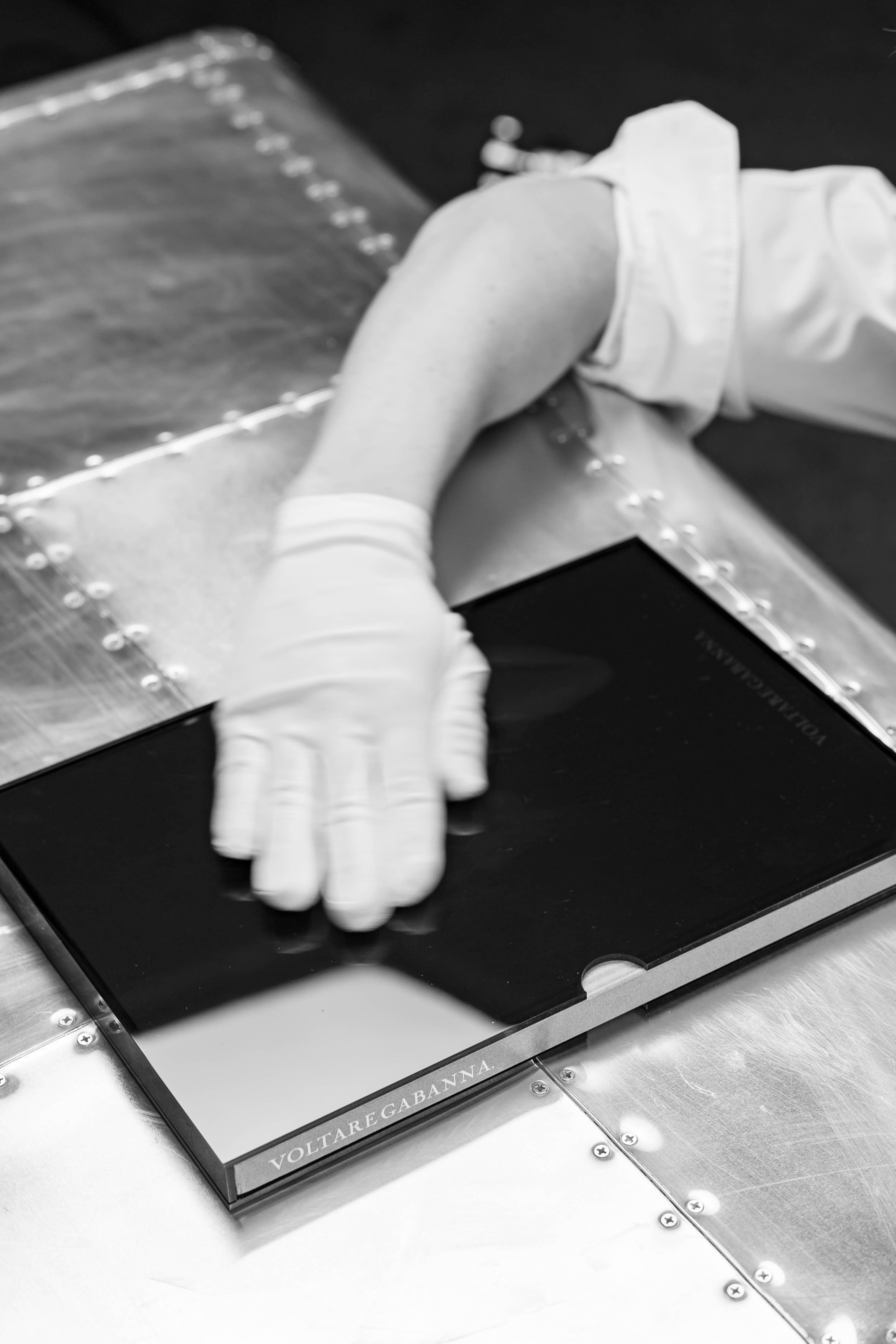 Dove grey album cover with embossed lettering
