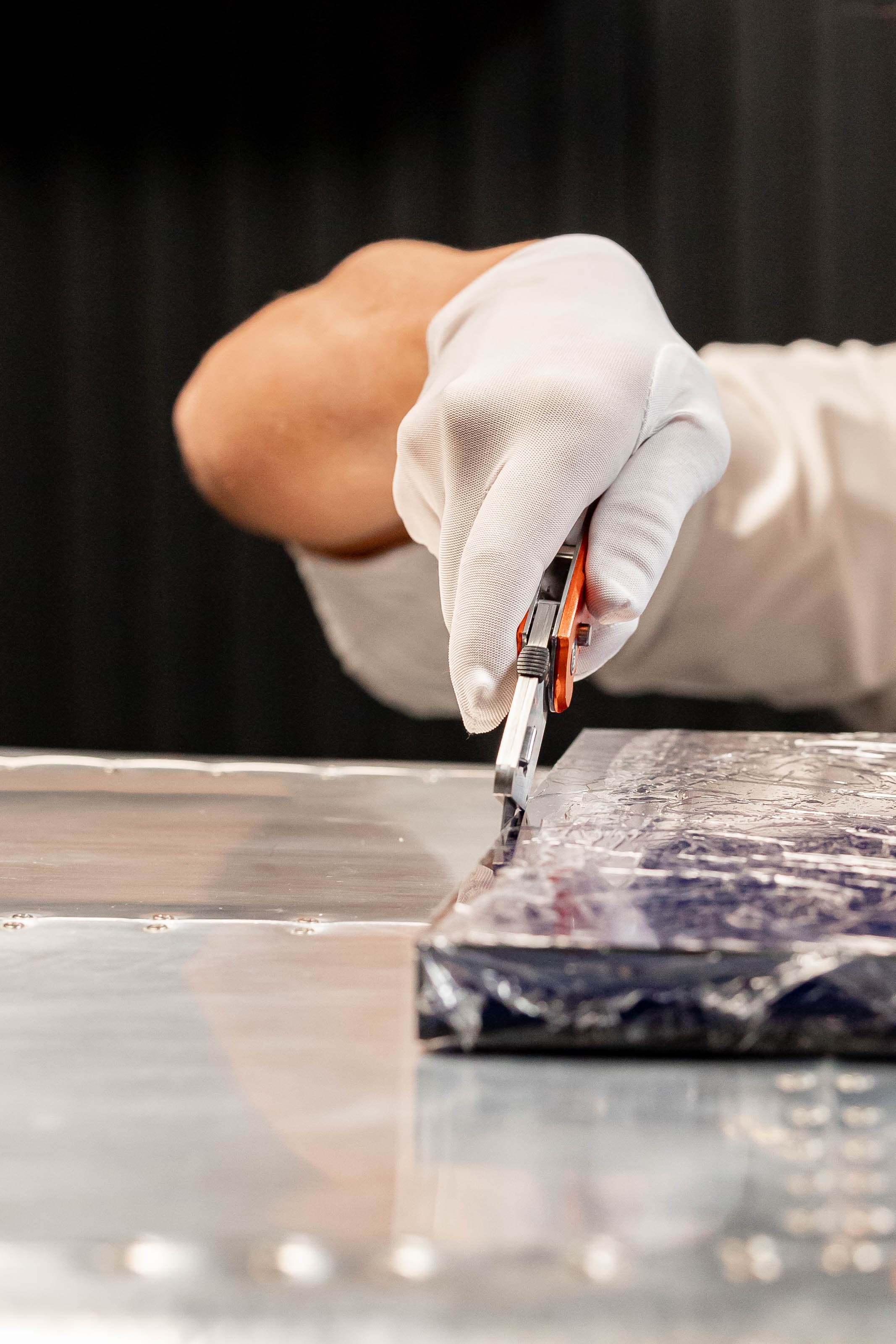 Precision cutting during album assembly