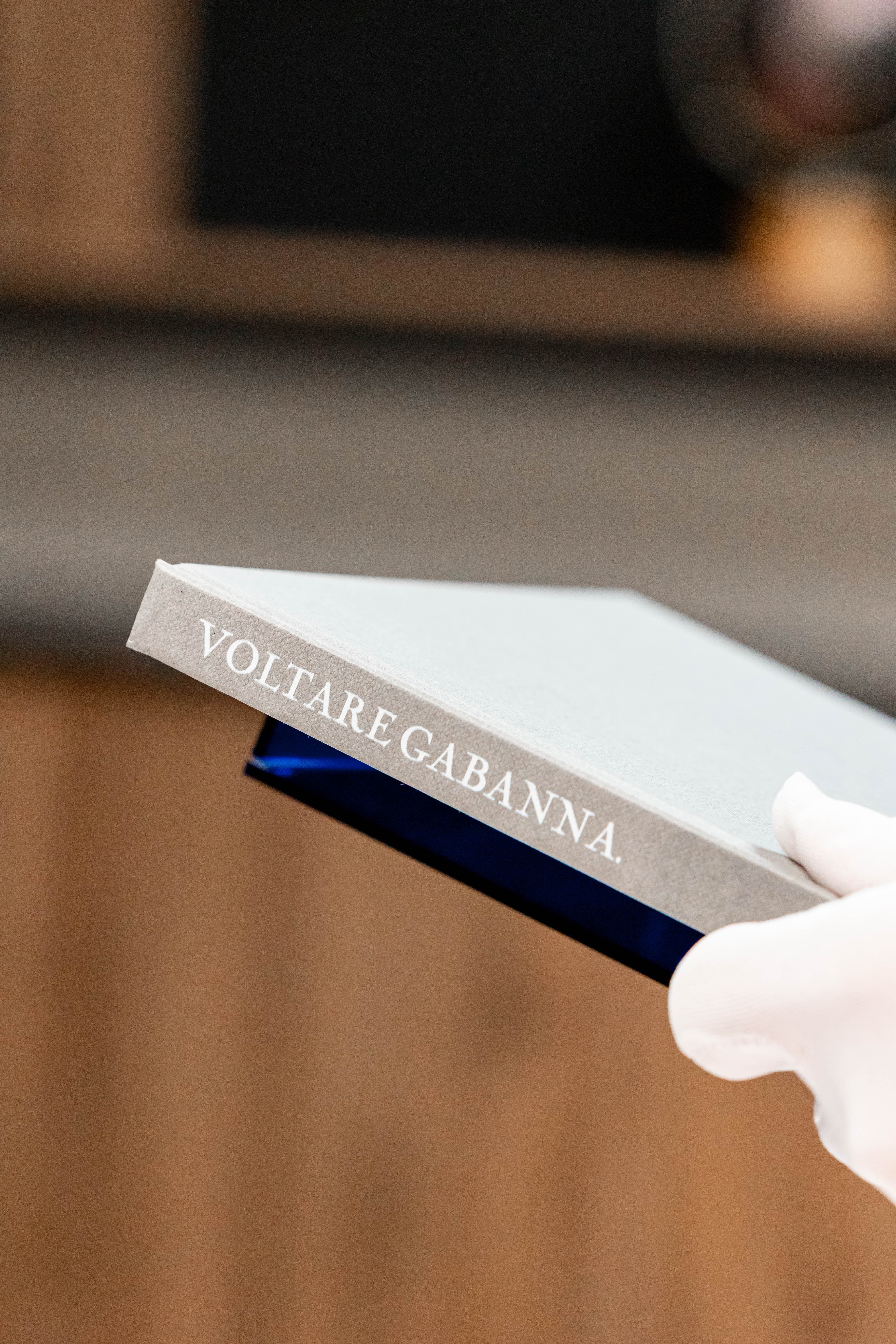 Album spine detail showing Voltare Gabanna branding